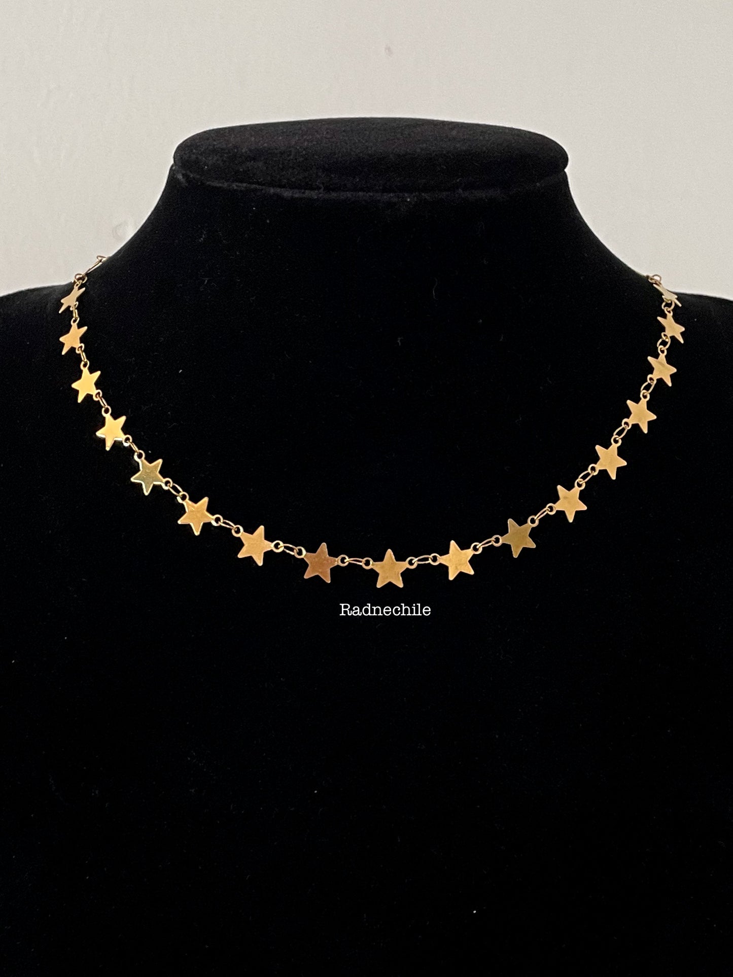 Collar estrellas acero gold